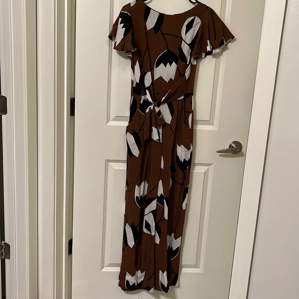 Anthropologie Brown jumpsuit with floral print
